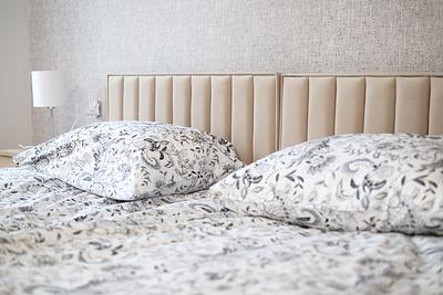 Fresh bedding on the bed in a room at the Hajduczek farm stay