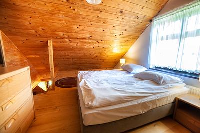 Sypialnia na górnym poziomie Studio Family